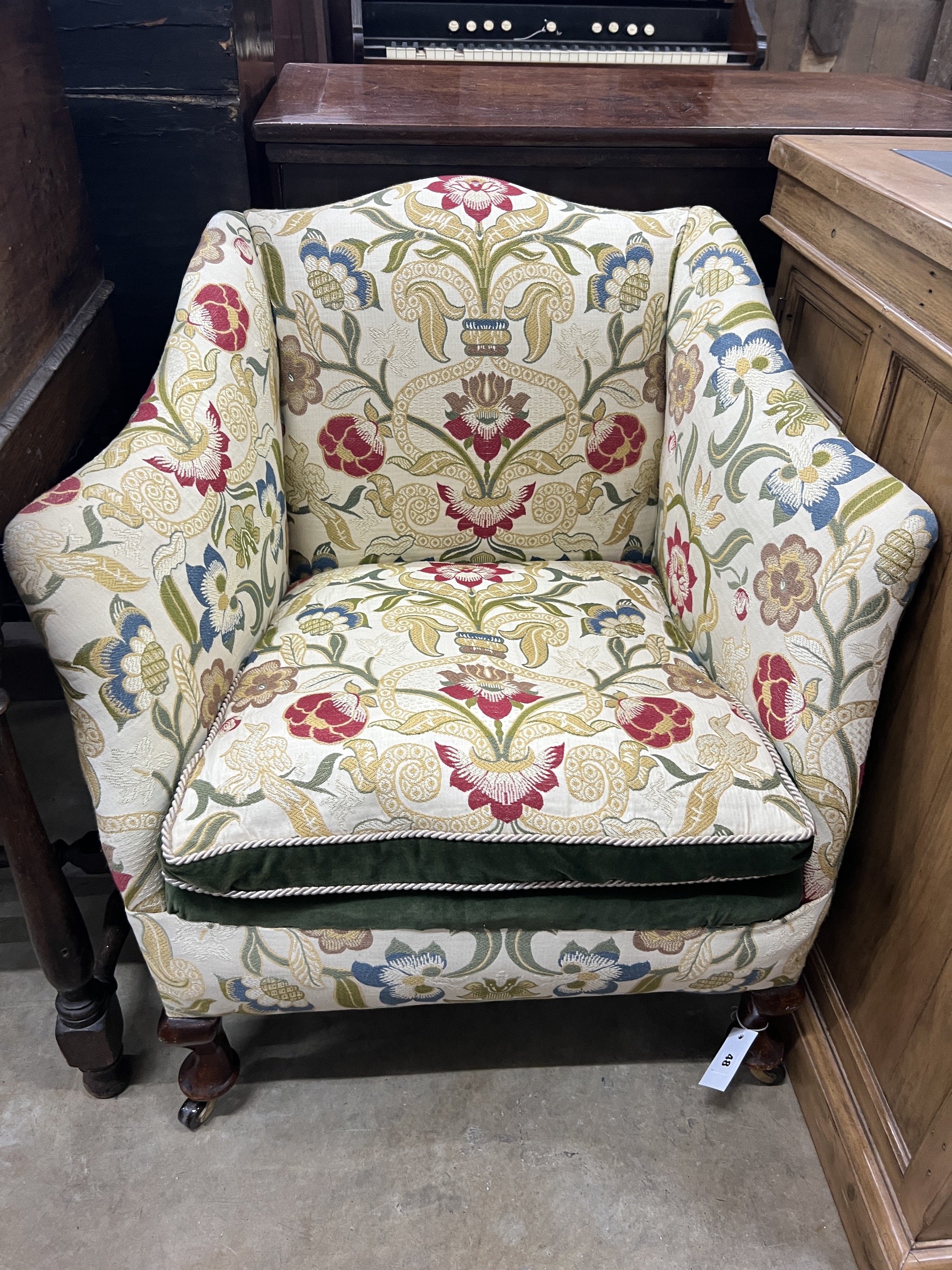 An Edwardian upholstered square framed elbow chair, width 72cm, depth 62cm, height 76cm